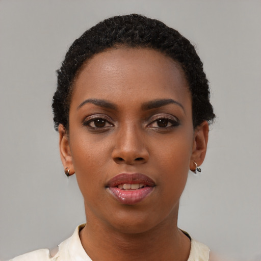 Neutral black young-adult female with short  black hair and brown eyes