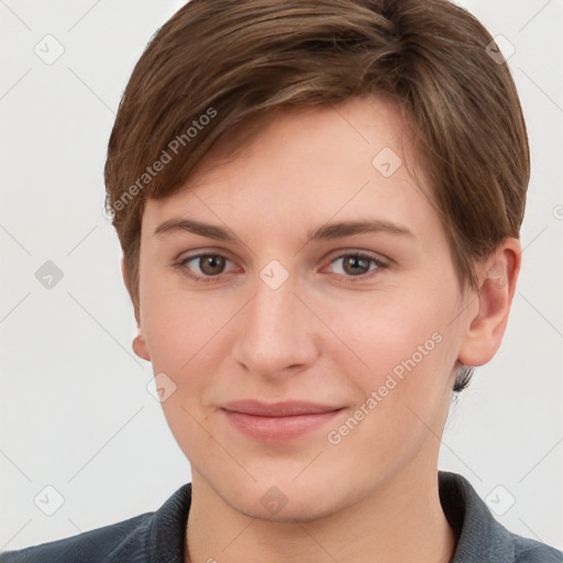 Joyful white young-adult female with short  brown hair and grey eyes