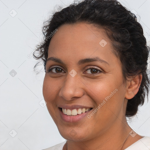 Joyful white young-adult female with short  brown hair and brown eyes