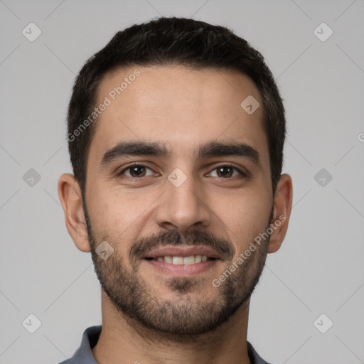 Joyful white young-adult male with short  brown hair and brown eyes