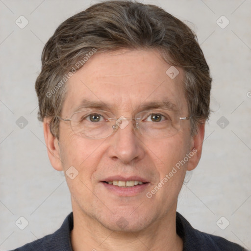 Joyful white adult male with short  brown hair and grey eyes