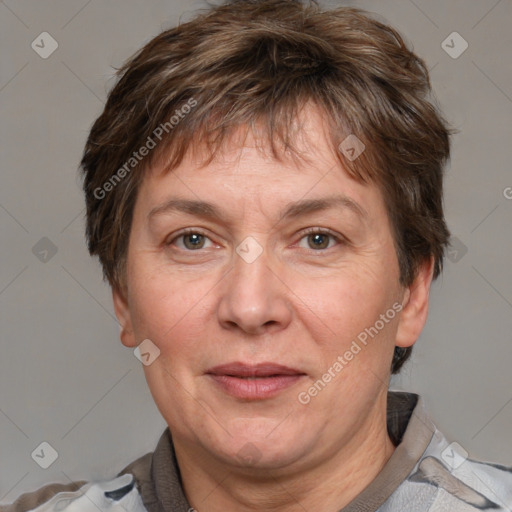 Joyful white adult female with short  brown hair and brown eyes