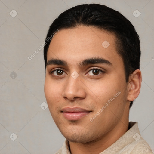 Joyful white young-adult male with short  black hair and brown eyes