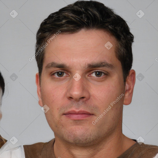 Neutral white young-adult male with short  brown hair and brown eyes