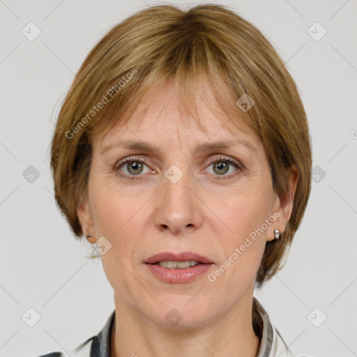 Joyful white adult female with medium  brown hair and grey eyes