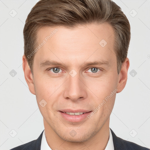 Joyful white adult male with short  brown hair and grey eyes