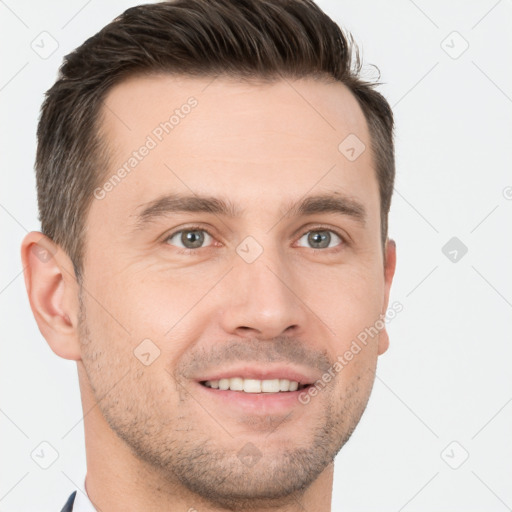 Joyful white young-adult male with short  brown hair and brown eyes