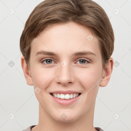 Joyful white young-adult female with short  brown hair and grey eyes