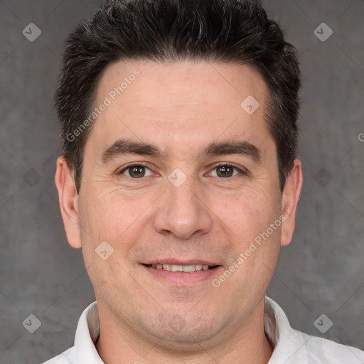 Joyful white adult male with short  brown hair and brown eyes