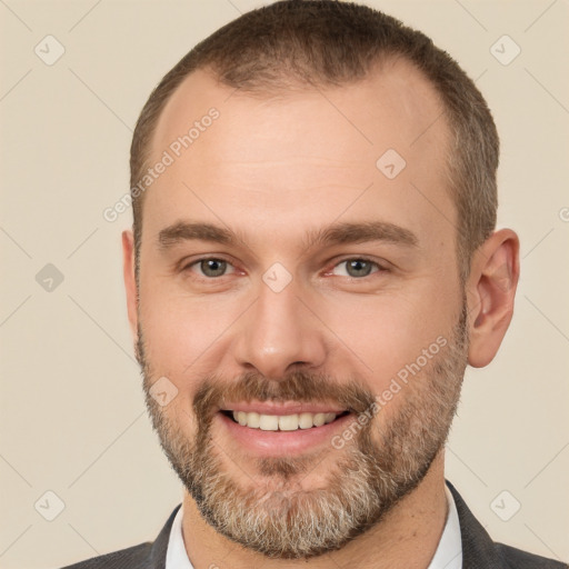 Joyful white adult male with short  brown hair and brown eyes