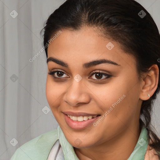 Joyful white young-adult female with long  brown hair and brown eyes