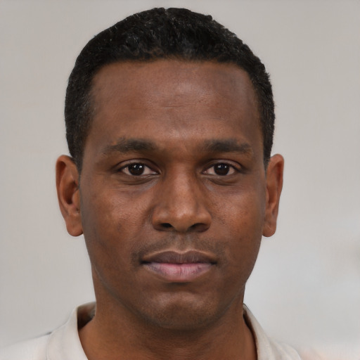 Neutral black young-adult male with short  black hair and brown eyes
