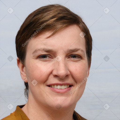 Joyful white adult female with medium  brown hair and grey eyes