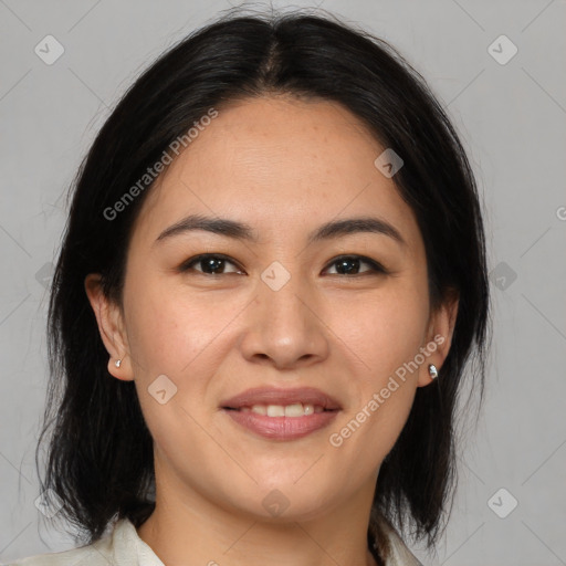 Joyful asian young-adult female with medium  brown hair and brown eyes