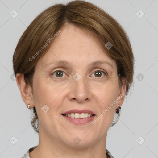 Joyful white adult female with medium  brown hair and grey eyes