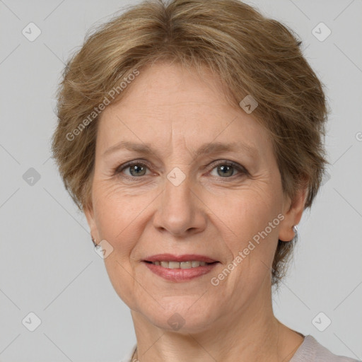 Joyful white adult female with short  brown hair and brown eyes