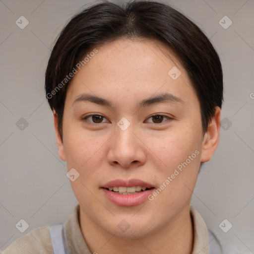 Joyful asian young-adult female with short  brown hair and brown eyes