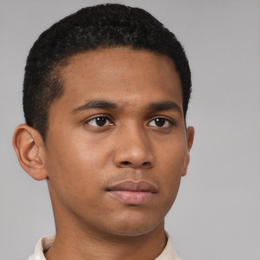 Neutral black young-adult male with short  brown hair and brown eyes
