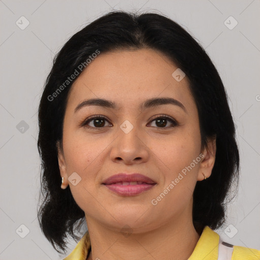 Joyful asian young-adult female with medium  black hair and brown eyes