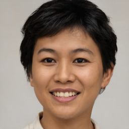 Joyful asian young-adult female with short  brown hair and brown eyes