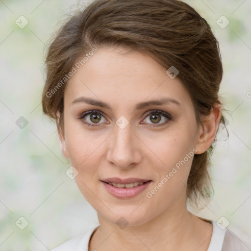 Joyful white young-adult female with medium  brown hair and green eyes