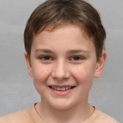 Joyful white child female with short  brown hair and brown eyes