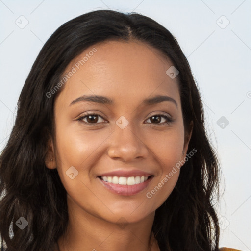 Joyful latino young-adult female with long  brown hair and brown eyes