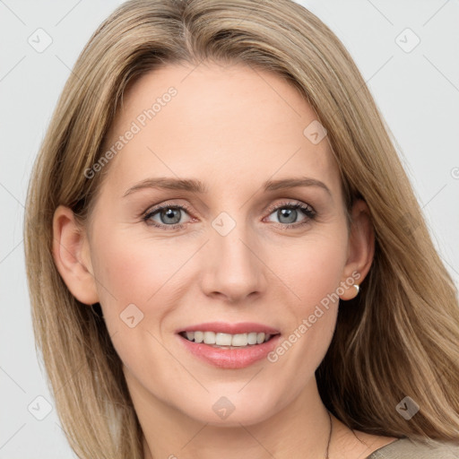 Joyful white young-adult female with medium  brown hair and blue eyes