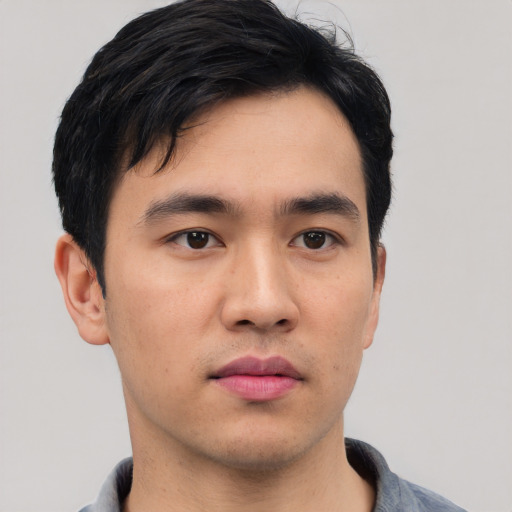 Neutral asian young-adult male with short  black hair and brown eyes