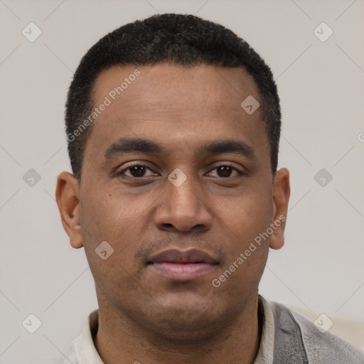 Neutral latino young-adult male with short  black hair and brown eyes