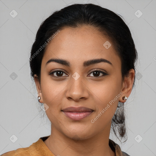 Joyful latino young-adult female with medium  black hair and brown eyes