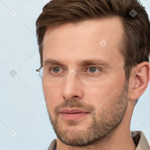 Neutral white adult male with short  brown hair and brown eyes