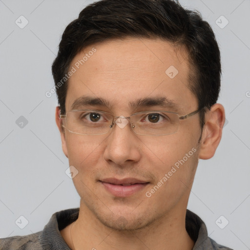 Joyful white adult male with short  brown hair and brown eyes