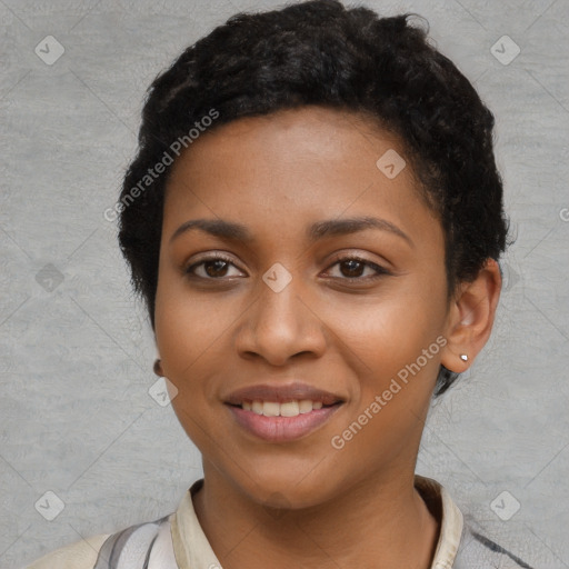 Joyful black young-adult female with short  black hair and brown eyes