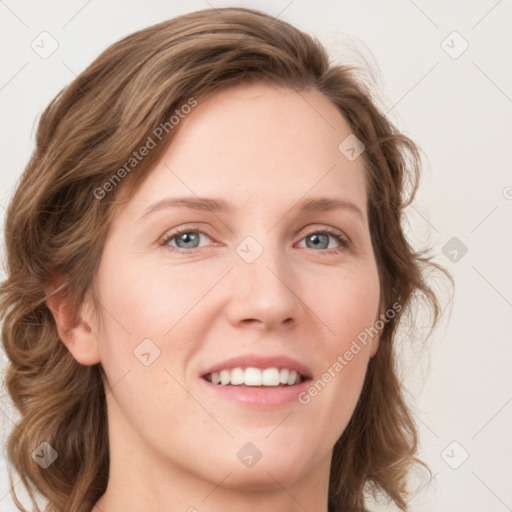 Joyful white young-adult female with medium  brown hair and blue eyes