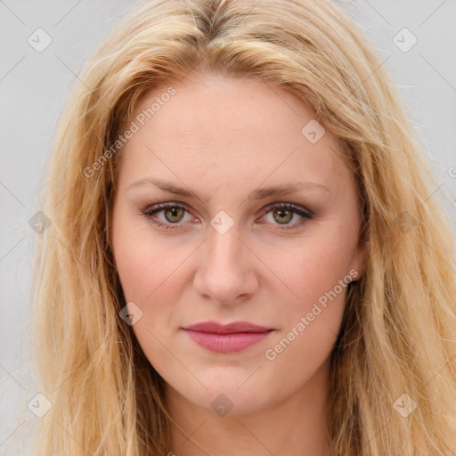 Joyful white young-adult female with long  brown hair and green eyes