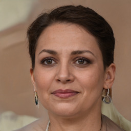 Joyful white adult female with short  brown hair and brown eyes