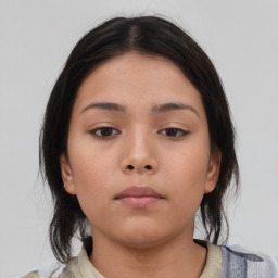 Neutral asian young-adult female with medium  brown hair and brown eyes