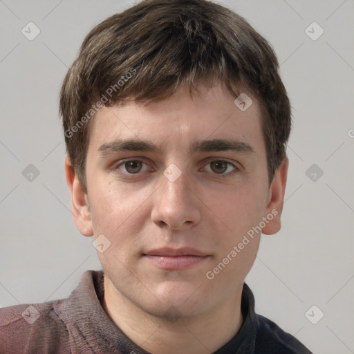 Neutral white young-adult male with short  brown hair and grey eyes