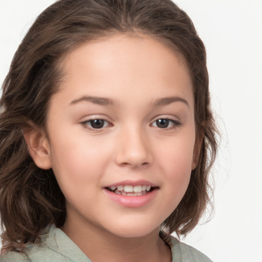 Joyful white child female with long  brown hair and brown eyes