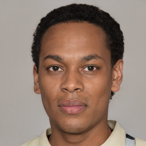 Neutral black young-adult male with short  black hair and brown eyes