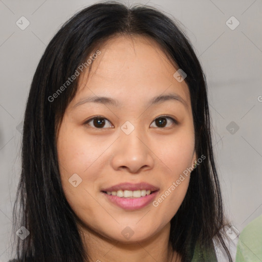 Joyful asian young-adult female with long  brown hair and brown eyes