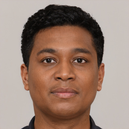 Neutral black young-adult male with short  black hair and brown eyes