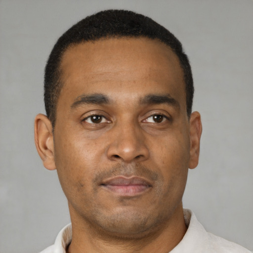 Neutral latino young-adult male with short  brown hair and brown eyes