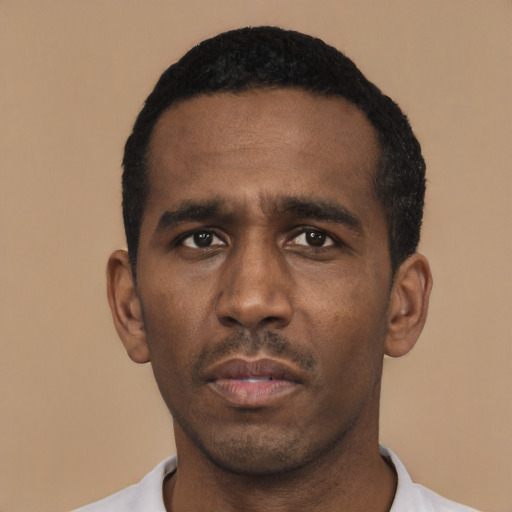 Neutral black young-adult male with short  black hair and brown eyes