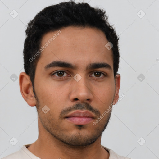 Neutral latino young-adult male with short  black hair and brown eyes