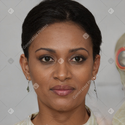 Joyful black young-adult female with short  brown hair and brown eyes