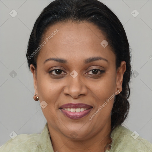 Joyful latino adult female with medium  brown hair and brown eyes