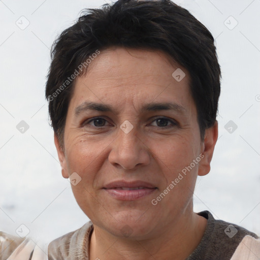 Joyful white adult female with short  brown hair and brown eyes