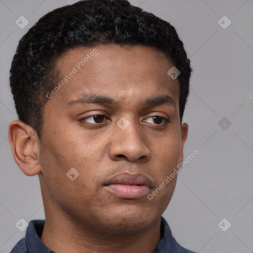 Neutral latino young-adult male with short  brown hair and brown eyes